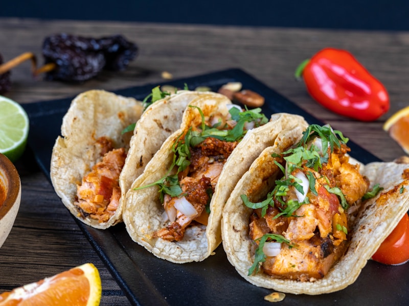 Fish tacos on a white plate