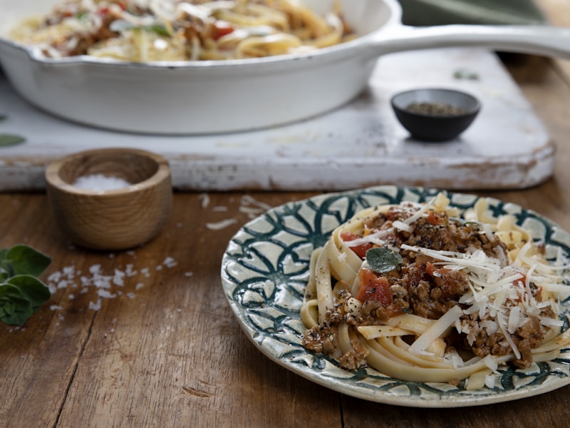 A bowl of spaghetti with rich meat ragù